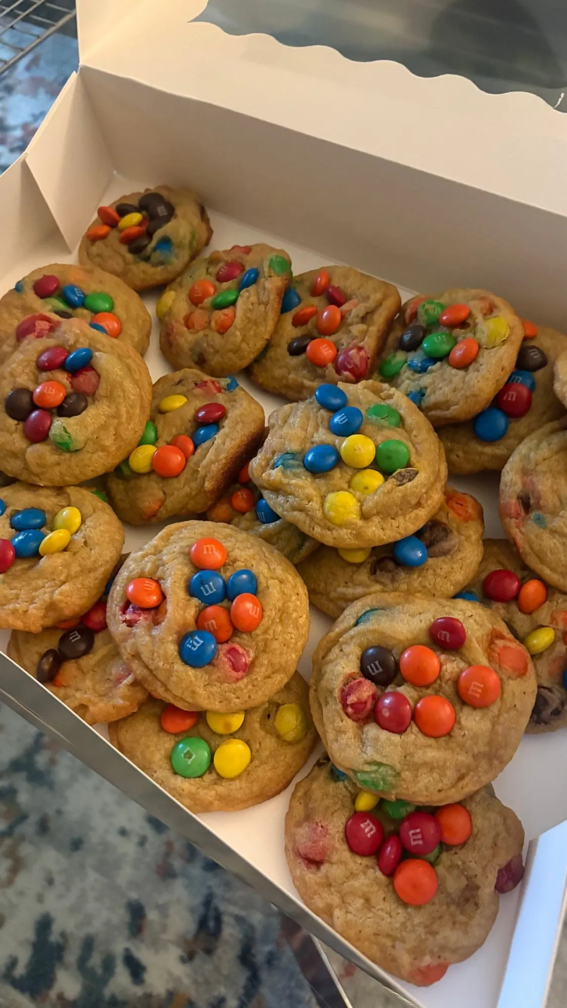 Box of soft cookies topped with colorful candy-coated chocolates